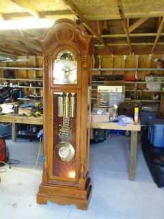 howard miller golden oak 77th anniversary grandfather clock