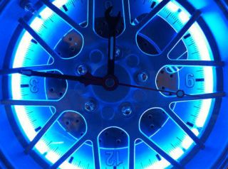 BLUE NEON TIRE WALL CLOCK Bright Blue Light, 10 inch Quartz Movement 