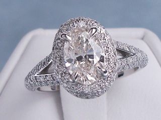 87 CARATS CT TW OVAL CUT DIAMOND ENGAGEMENT RING J SI2