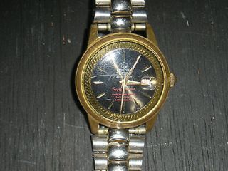 vintage Mortima day date mans watch is working it is very nice two 