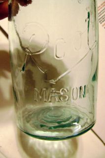 Antique Blue ROOT Mason Jar Quart with air bubbles.