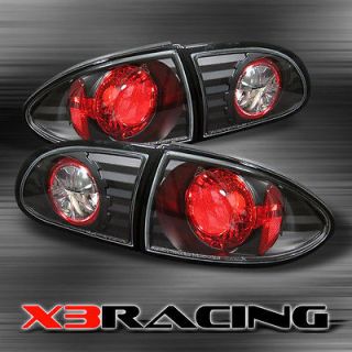 95 02 CHEVY CAVALIER BLK REAR TAIL BRAKE LIGHTS LAMPS (Fits: Cavalier)