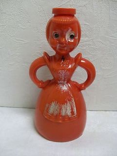   SPRINKLER   MID CENTURY RED PLASTIC MAID   MADE IN USA   7 INCH HEIGHT