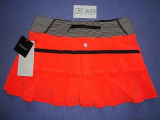   Run PaceSetter Skirt  size 2  Flare Light Tonka Stripe Cashew BLK