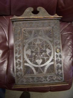 An Antique Floral Carved Wood 2 Door Hanging Cabinet with Shelf