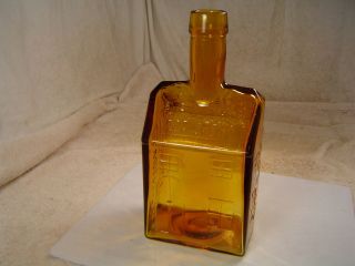 Nice amber glass E.C. Boozs Old Cabin Whiskey Bottle.
