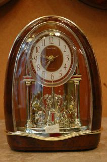 Rhythm Clock, Shelf, Rotating Pendulum, Swarovski.