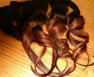   REMY ombre human hair clip in extensions. Two tone black and auburn
