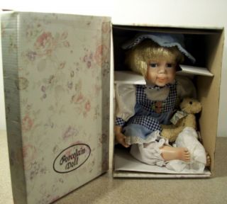 SUSIE LEE PORCELAIN DOLL WITH TEDDY BEAR