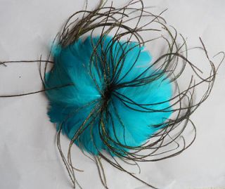   Beautiful Sun flower feather Lake blue head Dress and Flower Brooch