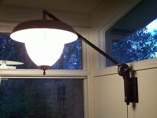 RARE  Circa 1927 Harry J. Bosworth Co. extendable arm dental lamp.