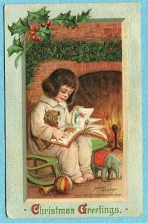 G8412 Frances Brundage postcard, Christmas, Girl reads by fireplace