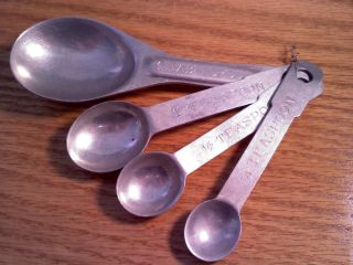 Set of 4 Aluminum Measuring Spoons, used 