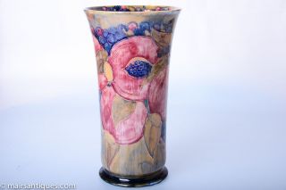 William Moorcroft Footed Cylinder Vase in Pomegranate to Ochre Ground 
