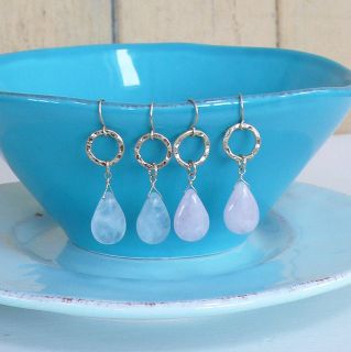 Pretty earrings with a hammered gold circle design and feature tear 