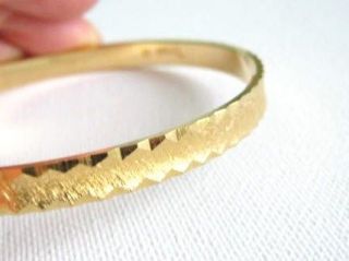 Vintage 1980s Trifari gold tone bangle  diamond cut bracelet jewelry