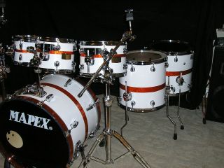 THESE MAPEX DRUMS WERE WRAPPED IN MY WHITE WRAP W/TANGERINE SPARKLE 