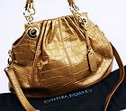NWOT   Cynthia Rowley gold leather spacious handbag. Dustcover 