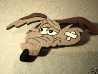 wylie coyote look a like cartoon character pin time left