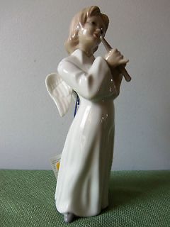 tengra angel with flute made in valencia spain 093 time
