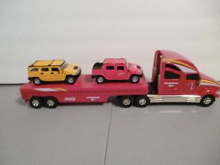 COCA COLA TRACTOR/FLAT BED TRAILER FEATURING TWO HUMMERS LOOSE