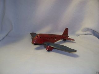 early toy steel airplane 7 inches long missing propeller has wooden 