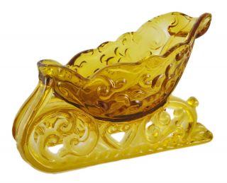 old fashioned amber glass sleigh wine bottle holder