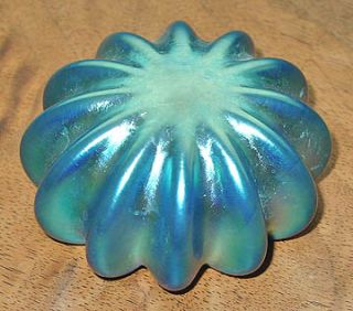   blue hand made by evan chambers of pavonine glass in atascadero