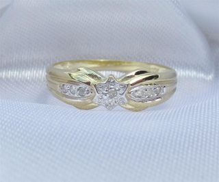 Dazzling genuine 7 DIAMOND band ring with star shaped centre in Solid 