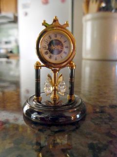   is a miniature bulova anniversary clock c 1988 it is very detailed