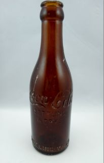 Antique Embossed Coke Amber Coca Cola Bottle  Hard to Find Wheeling W 