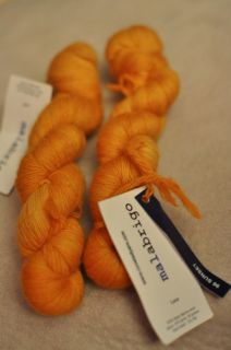 two stunning skeins of malabrigo lace in sunset from the site spun 