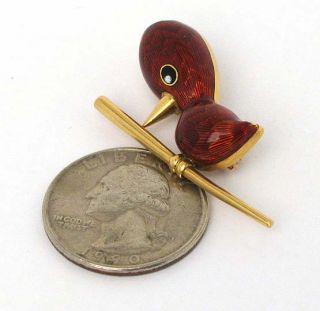 this is a cute 18k gold and enamel playful bird pin