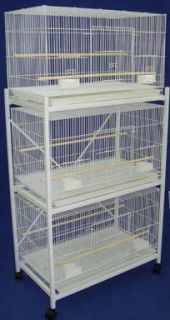   and one white stand cages 1 large lift up front doors 2 feeder cups 3