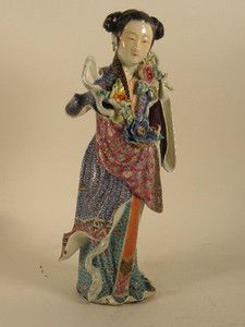 Chinese Porcelain Figure of A Lady with Flowers Circa 1900