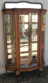 Oak Serpentine China Cabinet with leaded and beveled glass sides