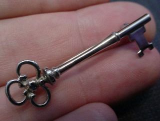 Authentic Tiffany Co Sterling Figural Key Pin w Bag
