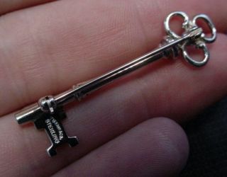 Authentic Tiffany Co Sterling Figural Key Pin w Bag
