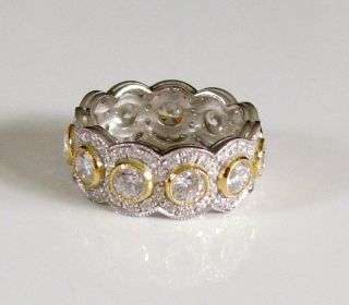 STERLING SILVER YELLOW EMBRACED CUBIC ZIRCONIA ETERNITY BAND RING