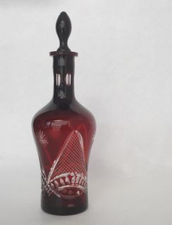 is this vintage ruby red real crystal bottle for water with crystal