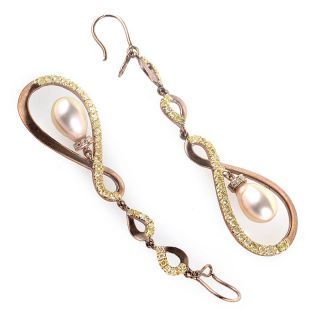This pair of drop earrings are lovely and sophisticated. They are made
