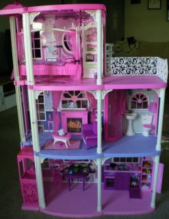 Story Barbie Dream House with elevator, furniture, dishes, food, and