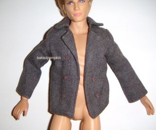 Up for bid is a gray wool jacket for Ken dolls, item is brand new has