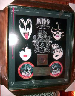   RIAA KISS SYMPHONY GOLD SALES DVD AWARD, PRESENTED TO ERIC CARR
