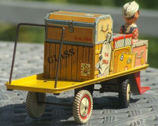 Finnegans Baggage Cart Tin Windup Toy    by Unique Art Manufacturing