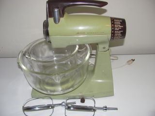  vintage Sunbeam Mixmaster in avocado green. Includes 2 glass bowls