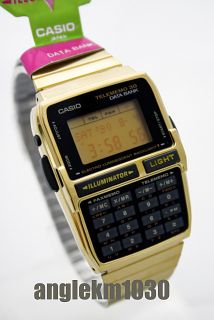 RARE Vintage Casio DBC 300 Calculator Watch Databank Gold Japan