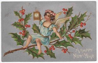 Postcard Angel Sitting on Holly and Holding Clock