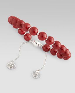  red available in red $ 270 00 gucci varnished wood bead bracelet red