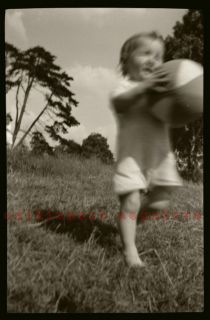 Negative Child with Ball Running Accidentally Awesome 1940s